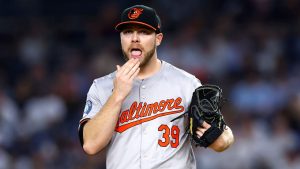 Baltimore Orioles' Corbin Burnes pauses before pitching against the New York Yankees during the first inning of a baseball game, Thursday, Sept. 26, 2024, in New York. (Noah K. Murray/AP)