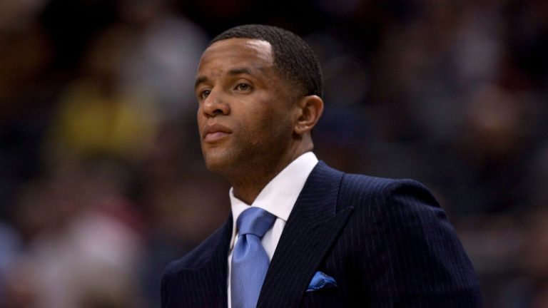 Former Raptor and current Memphis Grizzlies' assistant coach Damon Stoudamire stands courtside ahead of first half NBA basketball action in Toronto Monday January 24, 2011. (Chris Young/CP)