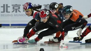 Danae Blais of Canada leads as she competes in the women's 1,000-meter final at the ISU World Tour Short Track Speed Skating held at the Capital Indoor Stadium in Beijing, Saturday, Dec. 7, 2024. (THE CANADIAN PRESS/AP-Andy Wong)