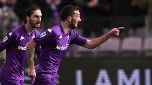 Fiorentina's Danilo Cataldi, right, celebrates scoring his side's first goal during the Serie A match between Fiorentina and Cagliari at the Artemio Franchi Stadium, in Florence, Italy, Sunday, Dec. 8, 2024. (Massimo Paolone/LaPresse/AP)