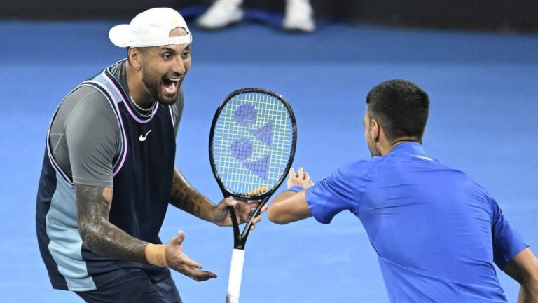 Australia's Nick Kyrgios, left, and Serbia's Novak Djokovic celebrate during their doubles match against Alexander Erler of Austria and Andreas Mies of Germany in the Brisbane International, at the Queensland Tennis Centre in Brisbane, Australia, Monday, Dec. 30, 2024. (Darren England/AAP Image/AP)