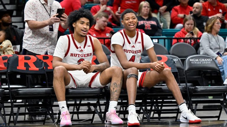 Rutgers guards Dylan Harper, left, and Ace Bailey sit court side before the second half of a game against Alabama Wednesday, Nov. 27, 2024. (David Becker/AP)