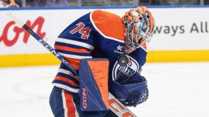 Edmonton Oilers goalie Stuart Skinner (74) makes a save against the Tampa Bay Lightning during third period NHL action in Edmonton on Tuesday, December 10, 2024. (Jason Franson/CP)