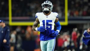 Dallas Cowboys running back Ezekiel Elliott warms up before a football game against the Tampa Bay Buccaneers Sunday, Dec. 22, 2024, in Arlington, Texas. (AP/Jeffrey McWhorter)