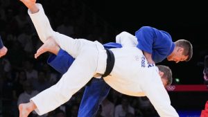 Canada's Francois Gauthier Drapeau, top, competes against Matthias Casse of Belgium in the repechage men's -81 kg judo match at the 2024 Summer Olympics in Paris, France on Tuesday, July 30, 2024. (Christinne Muschi/CP)