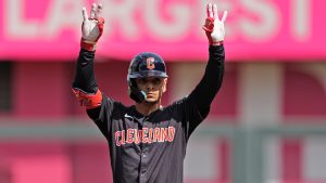 Andres Gimenez celebrates after hitting a double during the first inning of a baseball game against the Kansas City Royals Monday, Sept. 2, 2024, in Kansas City, Mo. (Charlie Riedel/AP)