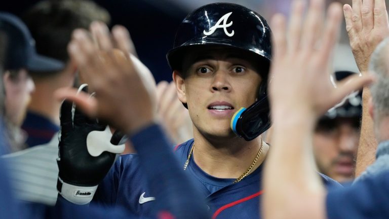 Former Atlanta Braves player Gio Urshela celebrates his two-run home run during the seventh inning of a baseball game against the Miami Marlins, Saturday, Sept. 21, 2024, in Miami. (Marta Lavandier/AP)