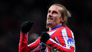 Atletico Madrid's Antoine Griezmann celebrates after scoring his side's third goal during the Champions League opening phase soccer match between Atletico Madrid and Slovan Bratislava at Riyadh Air Metropolitano stadium in Madrid, Spain, Wednesday, Dec. 11, 2024. (Manu Fernandez/AP)