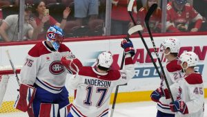 Montreal Canadiens goaltender Jakub Dobes (75) celebrates with his teammates after the Canadiens shut out the Florida Panthers 4-0 in an NHL hockey game, Saturday, Dec. 28, 2024, in Sunrise, Fla. (Lynne Sladky/AP)