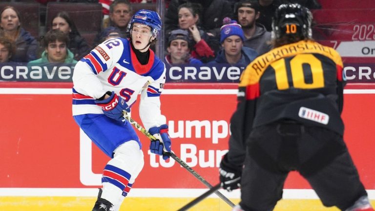 USA's James Hagens (12) looks for a pass past Germany's Timo Ruckdaschel (10) during 2025 IIHF World Junior Championship action in Ottawa on Thursday, Dec. 26, 2024. (Sean Kilpatrick/CP)
