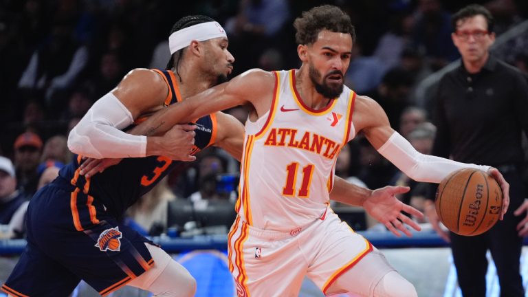 Atlanta Hawks' Trae Young (11) drives past New York Knicks' Josh Hart (3) during the first half of an Emirates NBA Cup basketball game Wednesday, Dec. 11, 2024, in New York. (Frank Franklin II/AP)