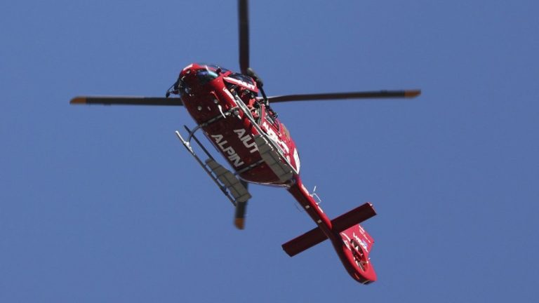 Emergencies helicopter takes Switzerland's Gino Caviezel to the hospital after his fall during an alpine ski, men's World Cup Super G race, in Bormio, Italy, Sunday, Dec. 29, 2024. (Marco Trovati/AP)