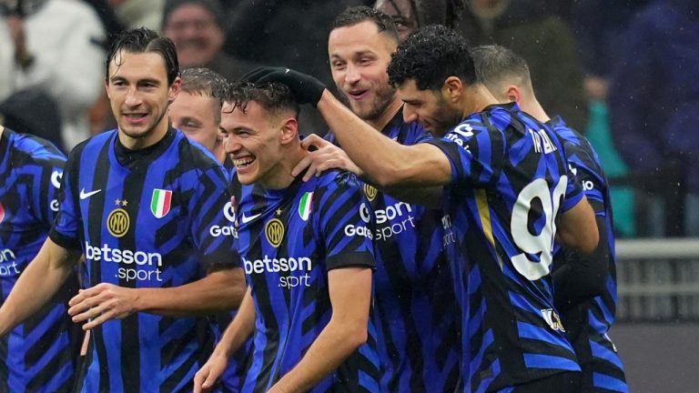 Inter Milan's Kristjan Asllani, center, celebrates with teammates after scoring their second goal during the Italian Cup round of 16 soccer match between Inter Milan and Udinese at SanSiro Stadium in Milan, Italy, Wednesday, Dec. 19, 2024. (Spada/LaPresse/AP)