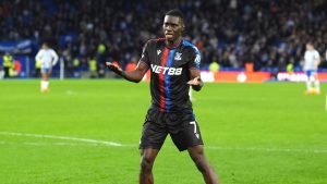 Crystal Palace's Ismaila Sarr celebrates scoring during the English Premier League match between Brighton and Hove Albion and Crystal Palace, at the American Express Stadium, in Brighton and Hove, England, Sunday, Dec. 15, 2024. (Zac Goodwin/PA via AP)