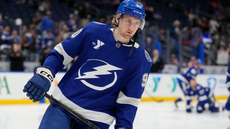 Tampa Bay Lightning defenseman J.J. Moser (90) before an NHL hockey game against the Philadelphia Flyers Thursday, Nov. 7, 2024, in Tampa, Fla. (AP Photo/Chris O'Meara)