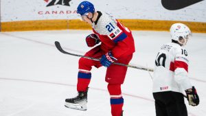 Czechia forward Jakub Stancl (21) celebrates his goal against Switzerland goaltender Elijah Neuenschwander during third period IIHF World Junior Hockey Championship preliminary round action in Ottawa, Thursday, Dec. 26, 2024. (Spencer Colby/CP)