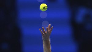 Italy's Jannik Sinner serves the ball to Russia's Daniil Medvedev during their singles tennis match of the ATP World Tour Finals. (Antonio Calanni/AP)