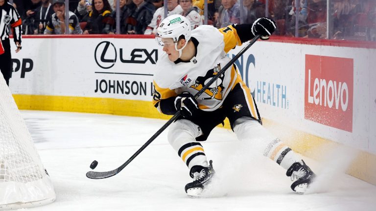 Pittsburgh Penguins' Jesse Puljujarvi (18) controls the puck behind the net of the Carolina Hurricanes during the first period of an NHL hockey game in Raleigh, N.C., Thursday, Nov. 7, 2024. (Karl B DeBlaker/AP)