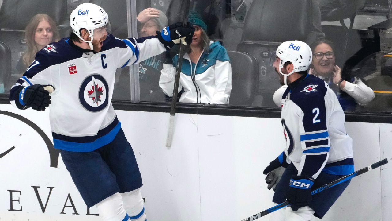 Lowry scores late goal to help Jets top Sharks