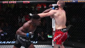 Joaquin Buckley, left, connects on a punch during a mixed martial arts bout at a UFC event. (UFC via Getty Images)