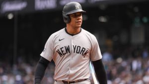 New York Yankees' Juan Soto walks back to the dugout after striking out against the Seattle Mariners during the first inning of a baseball game Thursday, Sept. 19, 2024, in Seattle. (Lindsey Wasson/AP)