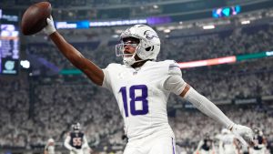 Minnesota Vikings wide receiver Justin Jefferson celebrates after catching a 7-yard touchdown pass during the first half of an NFL football game against the Chicago Bears, Monday, Dec. 16, 2024, in Minneapolis. (Abbie Parr/AP)