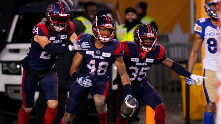 Montreal Alouettes defensive back Kabion Ento (48) celebrates with defensive back Reggie Stubblefield (35) and defensive back Marc-Antoine Dequoy (24) after intercepting a pass against the Winnipeg Blue Bombers during the second half of football action at the 110th CFL Grey Cup in Hamilton, Ont., on Sunday, November 19, 2023. (Frank Gunn/CP)