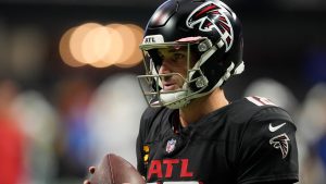 Atlanta Falcons quarterback Kirk Cousins (18) warms up before an NFL football game against the Los Angeles Chargers on Sunday, Dec. 1, 2024 in Atlanta. (AP Photo/Mike Stewart)