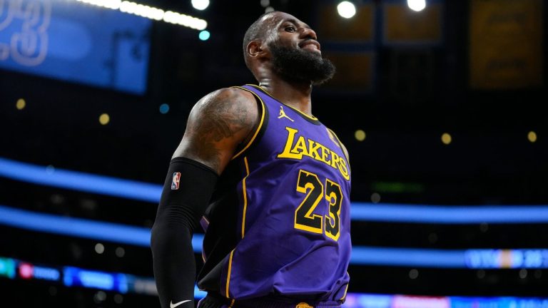 Los Angeles Lakers forward LeBron James celebrates after scoring a three-pointer during the first half of an NBA basketball game against the Memphis Grizzlies in Los Angeles, Friday, Jan. 5, 2024. (Ashley Landis/AP)