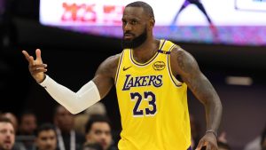 Los Angeles Lakers forward LeBron James (23) celebrates after scoring against the Sacramento Kings during the second half of an NBA basketball game in Sacramento, Calif., Thursday, Dec. 19, 2024. (Jed Jacobsohn/AP)