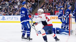 Washington Capitals centre Connor McMichael (24) celebrates his goal against the Toronto Maple Leafs during third period NHL hockey action in Toronto on Friday, December 6, 2024. (Cole Burston/CP)