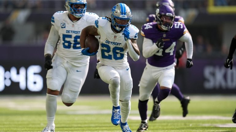 Detroit Lions running back Jahmyr Gibbs (26) runs for a 45-yard touchdown against the Minnesota Vikings during the first half of an NFL football game Sunday, Oct. 20, 2024, in Minneapolis. (AP Photo/Abbie Parr)