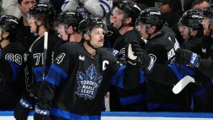 Toronto Maple Leafs centre Auston Matthews (34) celebrates his goal with teammates on the bench during first period NHL hockey action against the Chicago Blackhawks, in Toronto, Monday, Dec. 2, 2024. THE CANADIAN PRESS/Frank Gunn