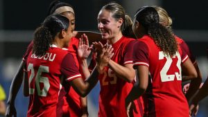 Canada's Marie Yasmine Alidou, left, celebrates after scoring his side's first goal during the international women's friendly soccer match between Canada and South Korea at the Pinatar Arena Football Centre in Murcia, Spain, on Tuesday, Dec. 3, 2024. (AP/Francisco Macia Martinez)