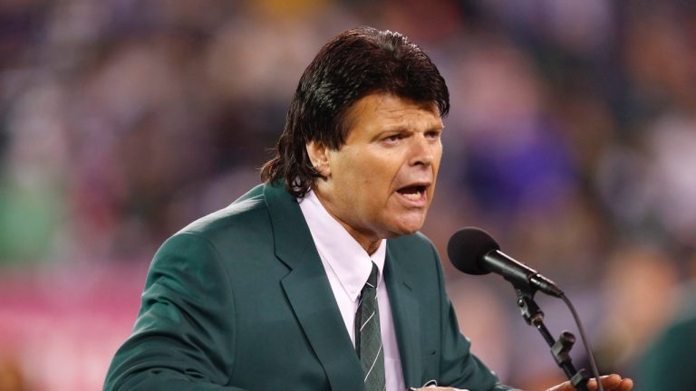 FILE - In this Oct. 8, 2012, file photo, former New York Jets defensive end Mark Gastineau speaks during halftime of an NFL game between the Jets and the Houston Texans in East Rutherford, N.J. (AP/Julio Cortez, File)