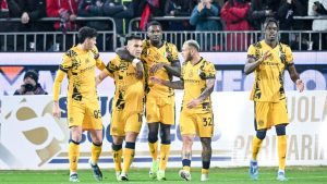 Inter Milan's Lautaro Martinez, second from left, celebrates with teammates after scoring his side's second goal during the Serie A soccer match between Cagliari Calcio and Inter Milan. (Gianluca Zuddas/LaPresse via AP)