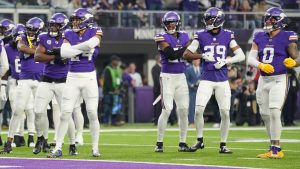 Minnesota Vikings' Camryn Bynum celebrates his fumble recovery with teammates during the first half of an NFL game against the Green Bay Packers Sunday, Dec. 29, 2024, in Minneapolis. (AP/Abbie Parr)