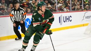 Minnesota Wild defenseman Brock Faber (7) skates against the Vancouver Canucks during the second period of an NHL hockey game Tuesday, Dec. 3, 2024, in St. Paul, Minn. The Wild won 3-2 in overtime. (Craig Lassig/AP)