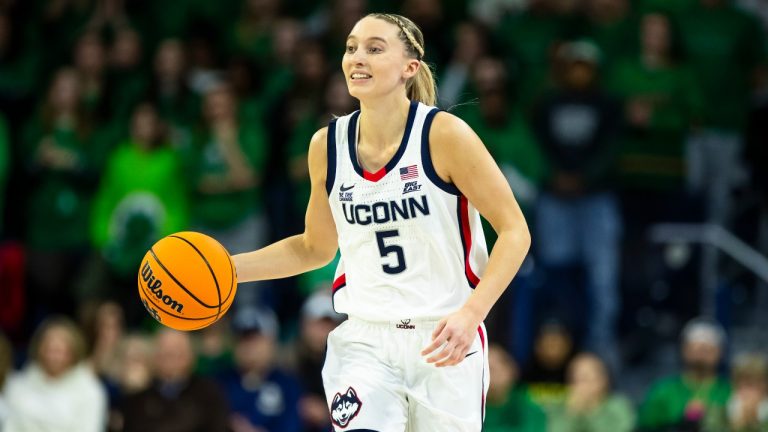 UConn guard Paige Bueckers (5) dribbles downcourt during the first half of an NCAA college basketball game against Notre Dame, Thursday, Dec. 12, 2024, in South Bend, Ind. (AP Photo/Michael Caterina)