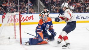 Florida Panthers' Jesper Boqvist (70) scores on Edmonton Oilers goalie Stuart Skinner (74) during first period NHL action in Edmonton on Monday, December 16, 2024. (Jason Franson/CP)