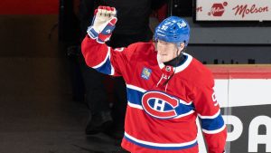 Montreal Canadiens' Patrik Laine (92) waves to the crowd after being named first star following their NHL hockey game against New York Islanders in Montreal on Tuesday, Dec. 3, 2024. (Christinne Muschi/CP)