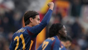 Roma's Paulo Dybala celebrates after scoring during the Italian Serie A soccer match between Roma and Parma at Rome's Olympic stadium, Sunday Dec. 22, 2024. (Alfredo Falcone/LaPresse/AP)