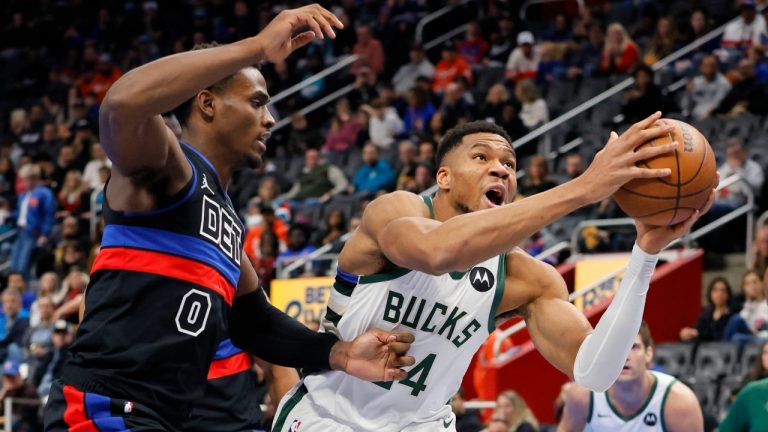 Milwaukee Bucks forward Giannis Antetokounmpo (34) goes to the basket past Detroit Pistons center Jalen Duren (0) during the first half of an Emirates NBA Cup basketball game Tuesday, Dec. 3, 2024, in Detroit. (AP Photo/Duane Burleson)