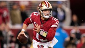 San Francisco 49ers quarterback Brock Purdy (13) rolls out during the first half of an NFL football game against the Detroit Lions, Monday, Dec. 30, 2024, in Santa Clara, Calif. (Godofredo A. Vásquez/AP)