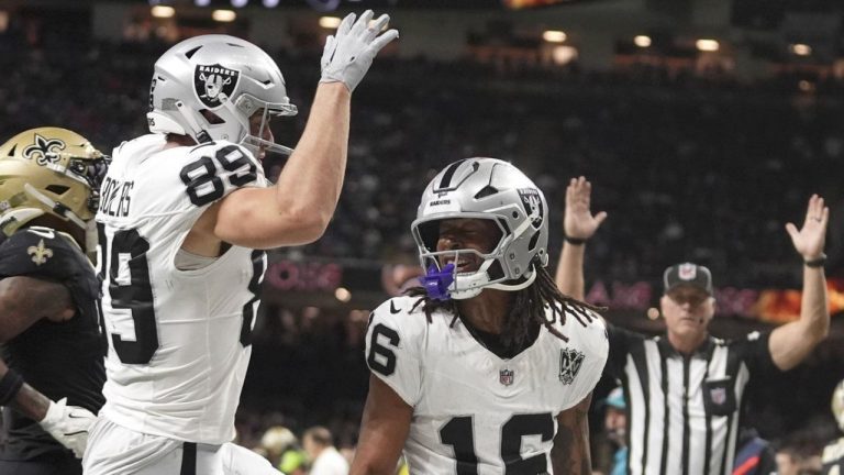 Las Vegas Raiders wide receiver Jakobi Meyers (16) celebrates with teammate tight end Brock Bowers (89) after catching a 3-yard touchdown pass during the first half of an NFL football game against the New Orleans Saints, Friday, Nov. 29, 2024, in New Orleans. (Gerald Herbert/AP)