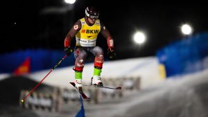 Reece Howden of Canada in action during the men's qualification run of the FIS Skicross World Cup, in Arosa, Switzerland, Monday, December 16, 2024. (Jean-Christophe Bott/Keystone via AP)