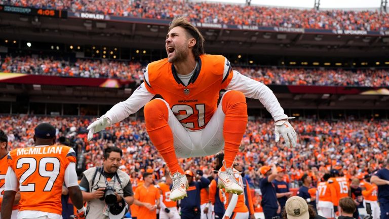 Denver Broncos cornerback Riley Moss (21) jumps on the sideline before the first half of an NFL football game against the Carolina Panthers, Sunday, Oct. 27, 2024, in Denver. (Jack Dempsey/AP)