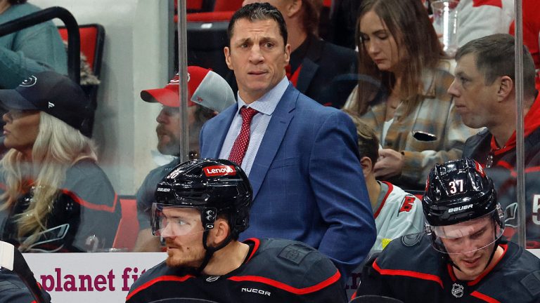 Carolina Hurricanes head coach Rod Brind'Amour, centre top, watches from the sideline during the second period of an NHL hockey game against the Ottawa Senators in Raleigh, N.C., Friday, Dec. 13, 2024. (Karl B DeBlaker/AP)