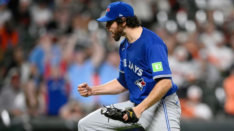 Toronto Blue Jays relief pitcher Jordan Romano starts to celebrate at the end of a baseball game against the Baltimore Orioles, Monday, May 13, 2024, in Baltimore. (Nick Wass/AP)