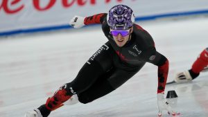 Gold medalist Felix Roussel of Canada competes in the men's 1,000-meter finals at the ISU World Tour Short Track Speed Skating held at the Capital Indoor Stadium in Beijing, Sunday, Dec. 8, 2024. (Andy Wong/AP)